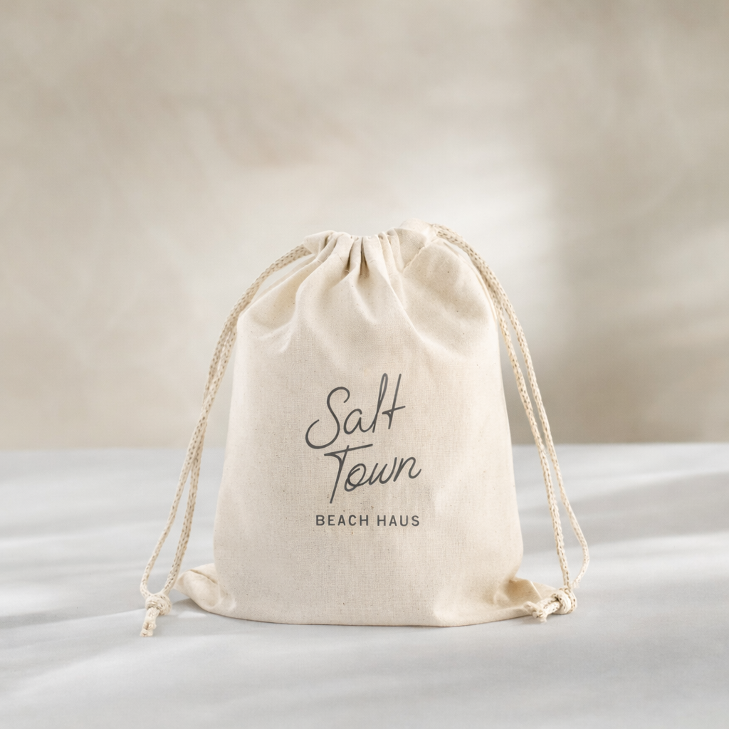 Beige drawstring bag with &