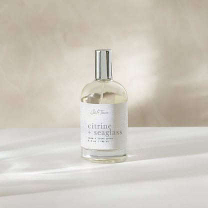 Room and linen spray bottle labeled &