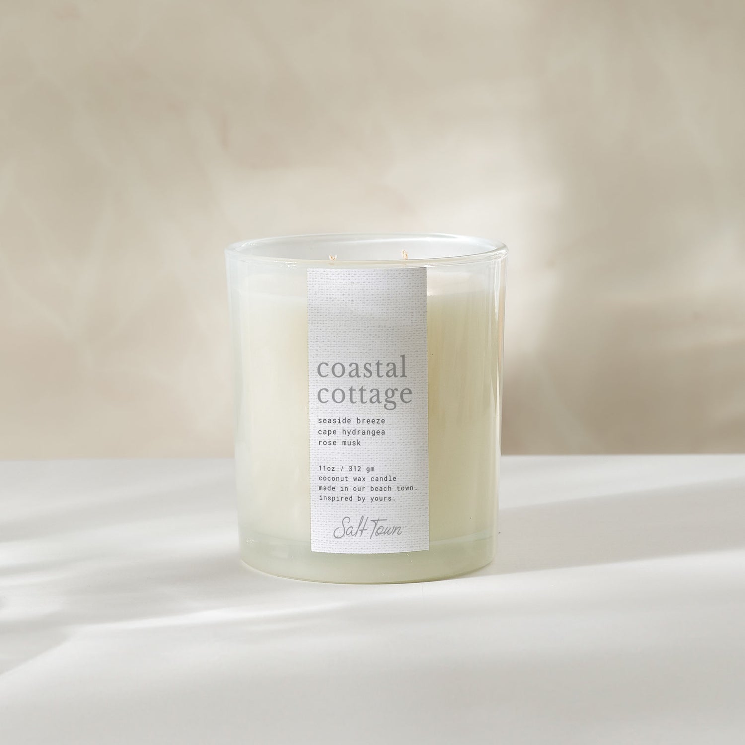 Candle labeled &